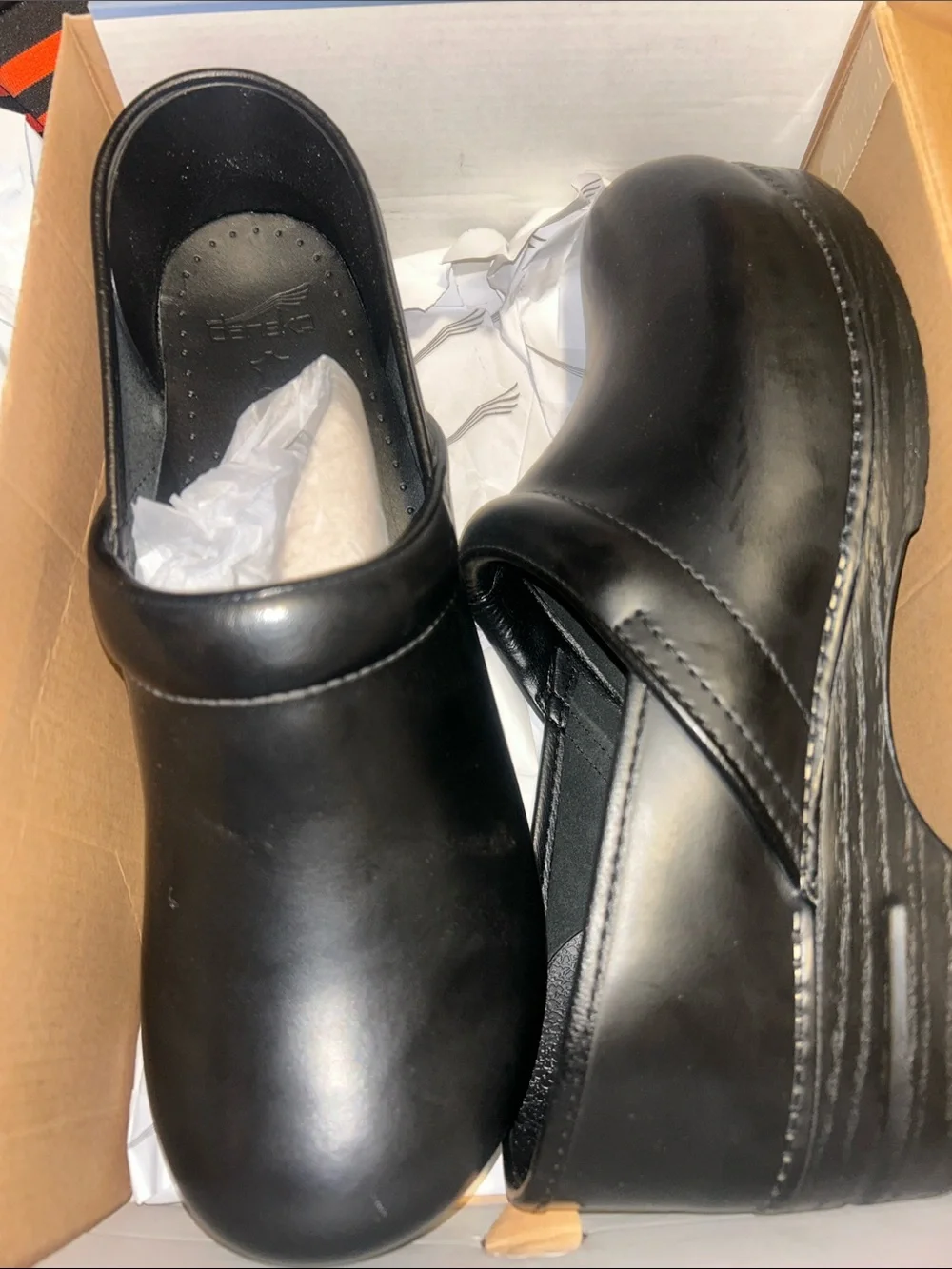 Dansko Black Slip-On Leather Clogs